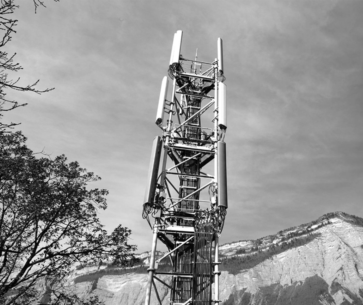 Black and white image of a telecommunications tower